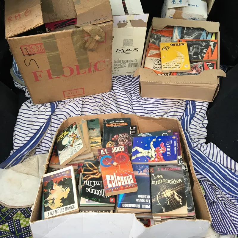 Boxes of vintage French science fiction paperbacks